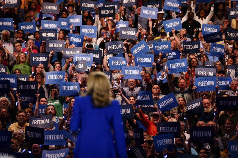 Supporters hold signs stating “Freedom” as Vice President Kamala Harris, the Democratic presidential nominee, campaigned earlier this week in Milwaukee. Democrats are stressing that message this year, along with faith and patriotism — concepts Republicans have emphasized in the past. (Erin Schaff/The New York Times)
                      