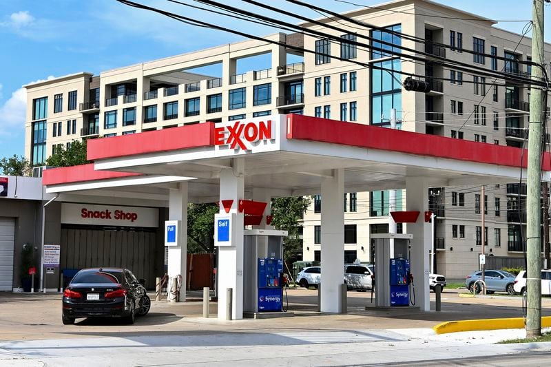 A closed Exxon gas station without power is seen in Houston, Wednesday, July 10, 2024. Nearly 1.3 million homes and businesses in the area remained without power Wednesday after Hurricane Beryl. (AP Photo/Maria Lysaker)