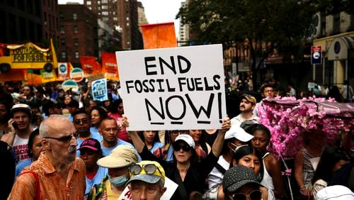 FILE - Climate activists attend a rally to end fossil fuels, in New York, Sept. 17, 2023. (AP Photo/Bryan Woolston, File)