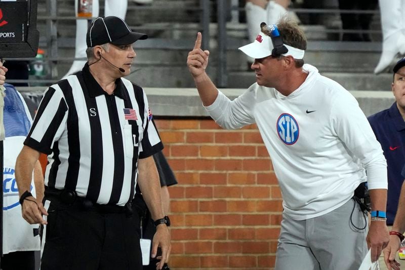 Mississippi head coach Lane Kiffin argues a call with an official during the first half of an NCAA college football game against Wake Forest in Winston-Salem, N.C., Saturday, Sept. 14, 2024. (AP Photo/Chuck Burton)