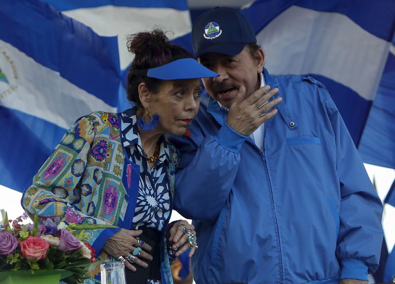 FILE - Nicaragua's President Daniel Ortega and his wife and Vice President Rosario Murillo attend a rally in Managua, Nicaragua, Sept. 5, 2018. (AP Photo/Alfredo Zuniga, File)