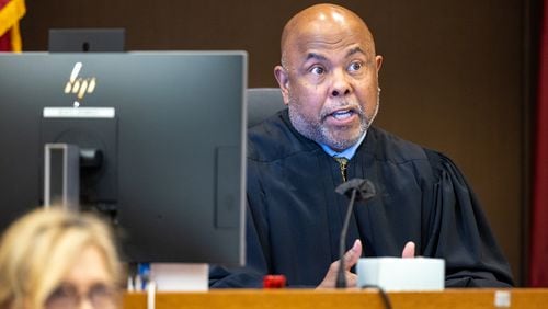 Judge Ural Glanville speaks to a juror during proceedings for the “Young Slime Life” gang trial in Atlanta on Monday, October 23, 2023. (Arvin Temkar / arvin.temkar@ajc.com)