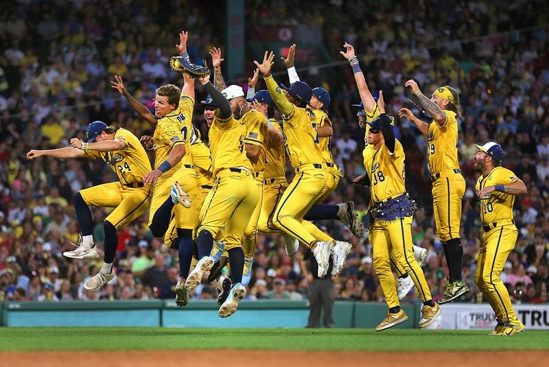 The Savannah Bananas celebrate a run in the 6th inning. The Savannah Bananas took their World Tour to a sold-out Fenway Park on Saturday, June 8, 2024, as they played the Party Animals before over 37,000 fans in Boston. (John Tlumacki/The Boston Globe)