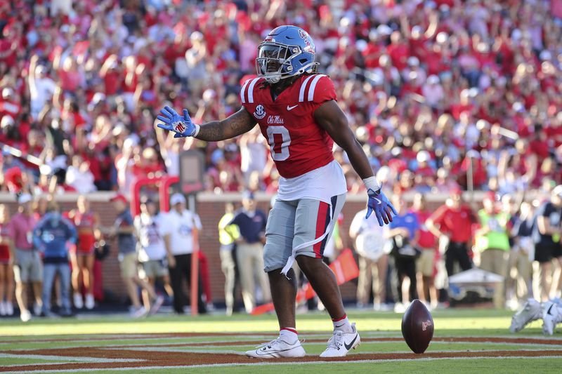 Mississippi running back Matt Jones (0) reacts after scoring a touchdown during the second half of an NCAA college football game against Middle Tennessee on Saturday, Sept. 7, 2024, in Oxford, Miss. (AP Photo/Randy J. Williams)