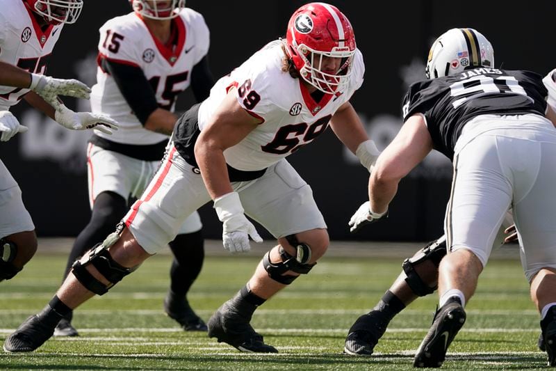 FILE - Georgia offensive lineman Tate Ratledge (69) plays against Vanderbilt in the first half of an NCAA college football game Saturday, Oct. 14, 2023, in Nashville, Tenn. (AP Photo/George Walker IV, File)