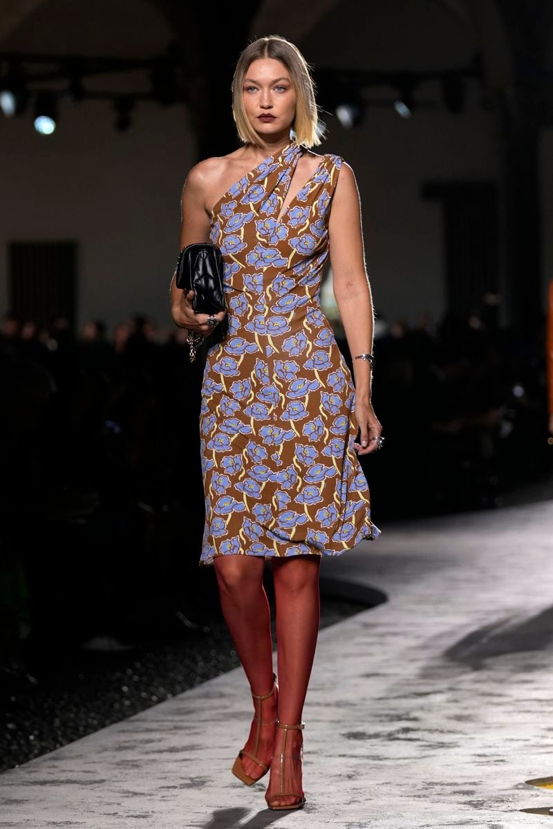 A model wears a creation as part of the Versace Spring Summer 2025 collection, that was presented in Milan, Italy, Friday, Sept. 20, 2024. (AP Photo/Antonio Calanni)