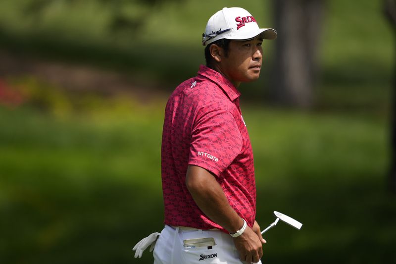 Hideki Matsuyama, of Japan, walks across the 14th green during the first round of the BMW Championship golf event at Castle Pines Golf Club, Thursday, Aug. 22, 2024, in Castle Rock, Colo. (AP Photo/Matt York)