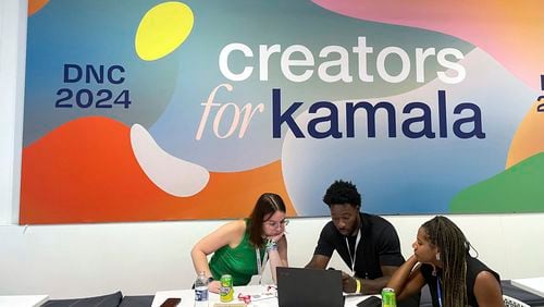 Content creators are pictured at the Democratic National Convention at the United Center in Chicago, Wednesday, Aug. 21, 2024. (AP Photo/Matt Brown)