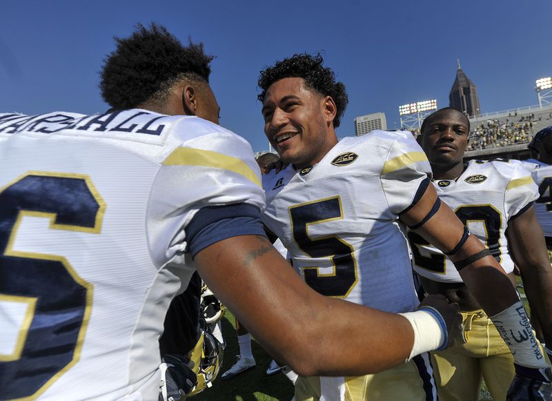 Atlanta, Ga. -- Georgia Tech senior QB Justin Thomas (5) congratulates sophomore QB TaQuon Marshall  (16) after their 38-35 win over Duke Saturday, October 29, 2016. SPECIAL/Daniel Varnado