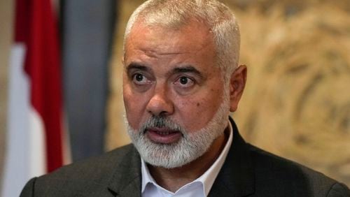 FILE - Ismail Haniyeh, leader of the Palestinian militant group Hamas, speaks to journalists after his meeting with Lebanese Parliament Speaker Nabih Berri, in Beirut, Lebanon, June 28, 2021. (AP Photo/Hassan Ammar, File)