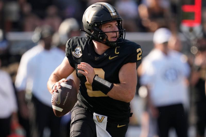 Vanderbilt quarterback Diego Pavia (2) runs with the ball during the first half of an NCAA college football game against Alabama, Saturday, Oct. 5, 2024, in Nashville, Tenn. (AP Photo/George Walker IV)