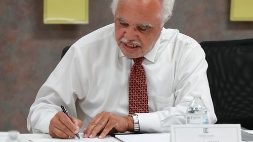 Nov 13, 2018 Decatur: Samuel Tillman is the first to sign his name after the DeKalb County Elections Board voted unanimously to certify it's election results at the DeKalb County Elections office on Tuesday, Nov. 13, 2018, in Decatur.  Curtis Compton/ccompton@ajc.com