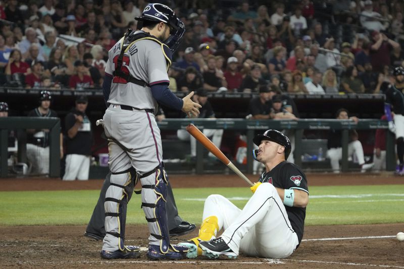 Arizona's Joc Pederson (a former Brave) points his bat at Atlanta catcher Travis d'Arnaud after getting hit by a pitch.