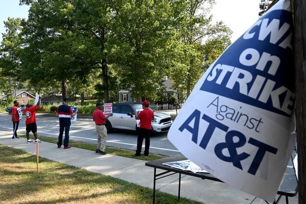 Striking AT&T workers hold signs outside AT&T facility on Brockett Road in Tucker on Aug. 30, 2024. The strike, which involved 17,000 workers in the region and 2,500 in metro Atlanta, ended Sunday, Sept. 15. (Hyosub Shin / AJC)