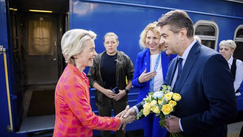 President of the European Commission, Ursula von der Leyen, left, is greeted as she arrives at the railway station in Kyiv, Ukraine, Friday, Sept. 20, 2024. (Christoph Soeder, Pool via AP)