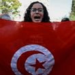 A Tunisian woman shouts slogans during a demonstration against Tunisia president Kais Saied, ahead of the upcoming presidential elections, in Tunis, Friday, Sept. 27, 2024. (AP Photo/Anis Mili)