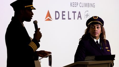 (L-R) Pilots Kyle Greene and Anya Kearns speak at graduation for Delta’s Aviation Career Education and Solo Flight Academy programs at Delta Headquarters in Atlanta on Thursday, July 14, 2022. (Arvin Temkar / arvin.temkar@ajc.com)