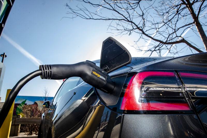 The Biden administration today will announce new domestic manufacturing standards for federally-funded electric vehicle chargers among other changes intended to expand the country’s network of charging stations. (Brittainy Newman/The New York Times)