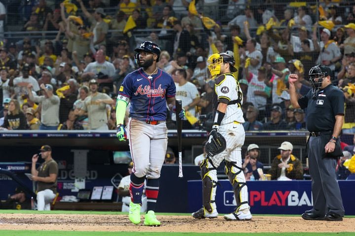 Atlanta Braves outfielder Michael Harris II (23) strikes ut against San Diego Padres relief pitcher Jason Adam as catcher Kyle Higashioka watches during the eighth inning of National League Division Series Wild Card Game One at Petco Park in San Diego on Tuesday, Oct. 1, 2024.   (Jason Getz / Jason.Getz@ajc.com)