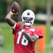 Miami Dolphins quarterback Tyler Huntley (18) throws a pass during practice at the NFL football team's training facility, Wednesday, Sept. 18, 2024, in Miami Gardens, Fla. (AP Photo/Lynne Sladky)