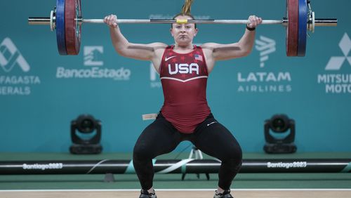 FILE - Olivia Reeves of the United States lifts in the women's 81-kilogram weightlifting event at the Pan American Games in Santiago, Chile, Oct. 23, 2023. Jourdan Delacruz, Wes Kitts, Hampton Morris, Reeves and Mary Theisen-Lappen will represent the U.S. in weightlifting at the Paris Olympics this summer. USA Weightlifting announced the team Friday, May 24, 2024. Kitts and Morris are looking to be the first American men to win an Olympic medal in the sport in four decades. (AP Photo/Moises Castillo, File)