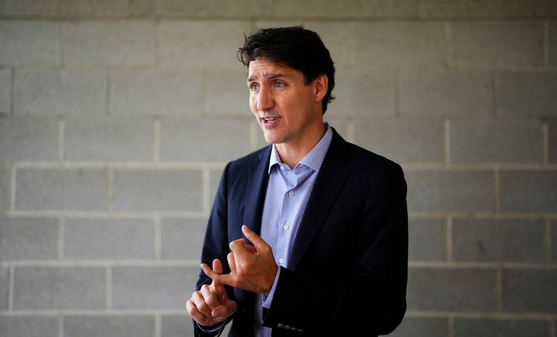 Prime Minister Justin Trudeau delivers a statement on the potential rail strike following an event in Gatineau, Quebec, Wednesday, Aug. 21, 2024. (Sean Kilpatrick/The Canadian Press via AP)