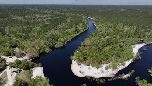 Drone photograph shows the St. Marys River in Macclenny, Florida, Wednesday, Mar. 20, 2024. The St. Marys River serves as the border between Georgia (right side) and Florida (left side). The 130-mile St. Marys River is a blackwater river located in southeast Georgia and is bordered by the Satilla River Basin to the north and the Suwannee River Basin to the west. (Hyosub Shin / Hyosub.Shin@ajc.com)