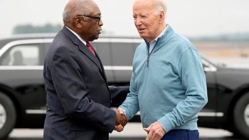 FILE - Rep. Jim Clyburn, D-S.C., left, greets President Joe Biden at the Columbia Metro Airport, in West Columbia, S.C., Jan. 27, 2024. Clyburn is often credited as the man who delivered the presidency to Joe Biden with a pivotal endorsement four years ago. But on Wednesday, the South Carolina congressman sent a resounding message to the Democratic president and elected officials across the nation that it may be time to move on when he outlined a process to replace Biden during an interview with CNN. Clyburn. (AP Photo/Jacquelyn Martin, File)