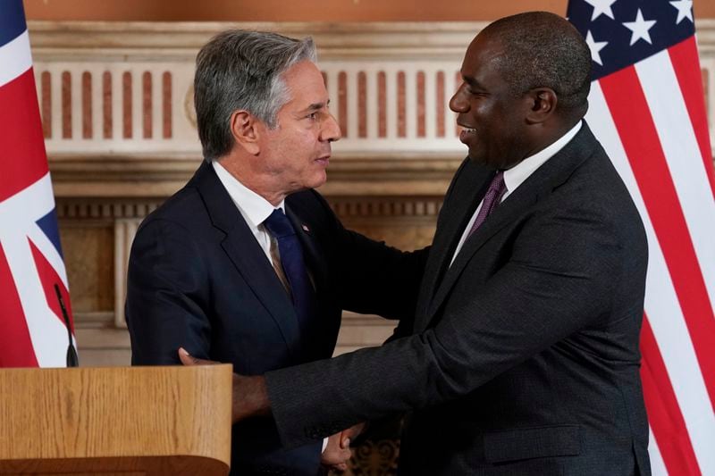 Secretary of State Antony Blinken, left and Britain's Foreign Secretary David Lammy shake hands at the end of their joint press conference in the Locarno room at the Foreign, Commonwealth and Development Office (FCDO) in London, Tuesday, Sept. 10, 2024. (AP Photo/Alberto Pezzali, Pool)