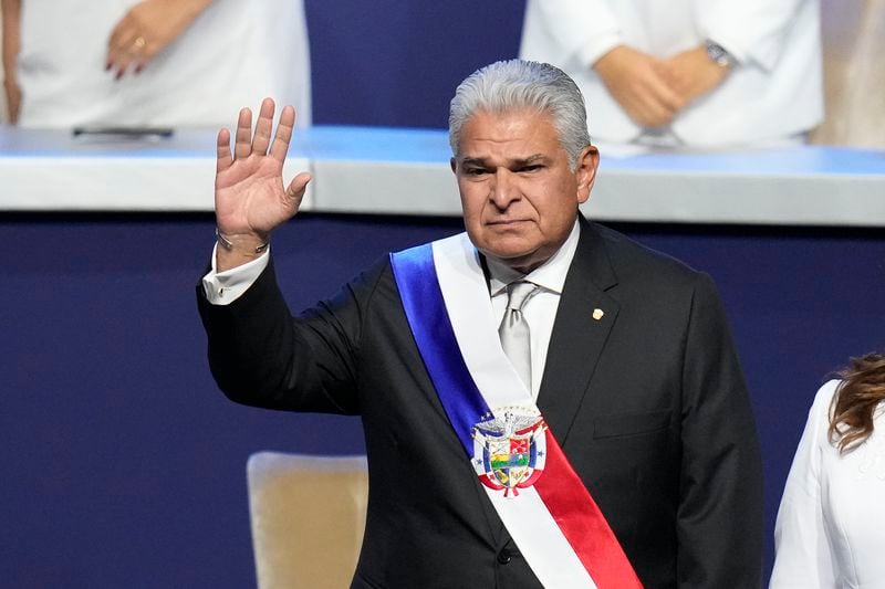 New Panamanian President Jose Raul Mulino waves before giving a speech at his swearing-in ceremony at the Atlapa Convention Centre in Panama City, Monday, July 1, 2024. (AP Photo/Matias Delacroix)