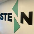 Logo of Stenn, a financial technology company, in its new Atlanta office.
CREDIT: Stenn