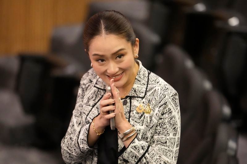 Leader of Pheu Thai Party, Paetongtarn Shinawatra, daughter of Thailand's former Prime Minister Thaksin Shinawatra, smiles before press conference in Bangkok, Thailand, Thursday, Aug. 15, 2024. (AP Photo/Sakchai Lalit)