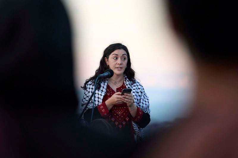 Kelsie Nabass, a friend of the 26-year old Aysenur Ezgi Eygi, killed recently in the occupied West Bank, during vigil on Alki Beach, Wednesday, Sept. 11, 2024, in Seattle. (AP Photo/John Froschauer)