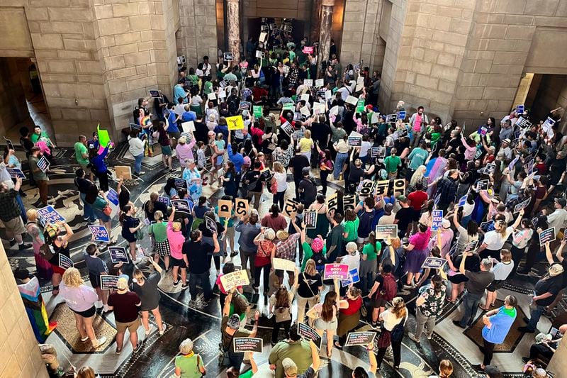 FILE - Hundreds of people gather at the Nebraska Capitol to protest against a proposed abortion ban, in Lincoln, on May 16, 2023. Organizers of competing petition efforts seeking to squelch or expand abortion access are looking to gather enough signatures before the early July 2024, deadline to make the November ballot. (AP Photo/Margery Beck, File)