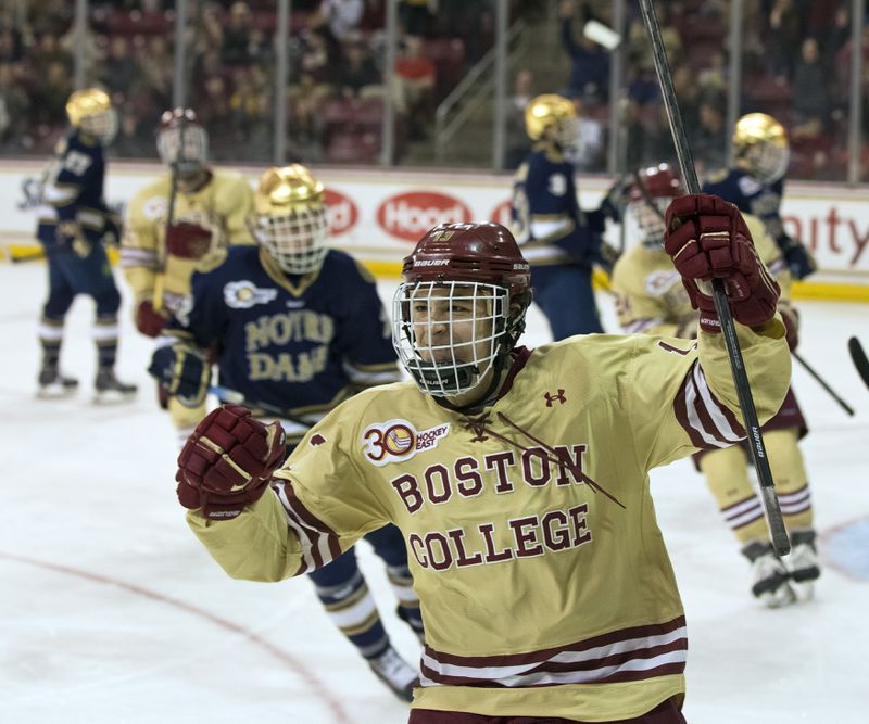 Boston College NCAA college hockey player Johnny Gaudreau celebrates his goal against Notre Dame during the third period of quarterfinal round match at the Hockey East Tournament in Chestnut Hill, Mass., March 15, 2014. (Matthew J. Lee/The Boston Globe via AP)