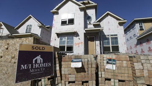 Prices for homes continues to rise with lower-priced homes in short supply. The price of land in metro Atlanta gives builders few incentives to build those starter houses. (AP Photo/LM Otero, File)