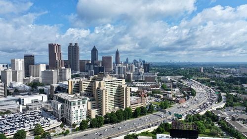 This aerial image shows the Atlanta downtown skyline ion May 15, 2024. 
(Miguel Martinez / AJC)