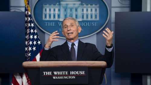 Dr. Anthony Fauci, director of the National Institute of Allergy and Infectious Diseases, addresses reporters about the coronavirus pandemic during a briefing at the White House in Washington on Thursday, Jan. 21, 2021. A day after President Biden reinstated American ties with the World Health Organization, Dr. Fauci told the organization that the United States was committed to working closely with other nations to implement a more effective global response to the pandemic. (Doug Mills/The New York Times)