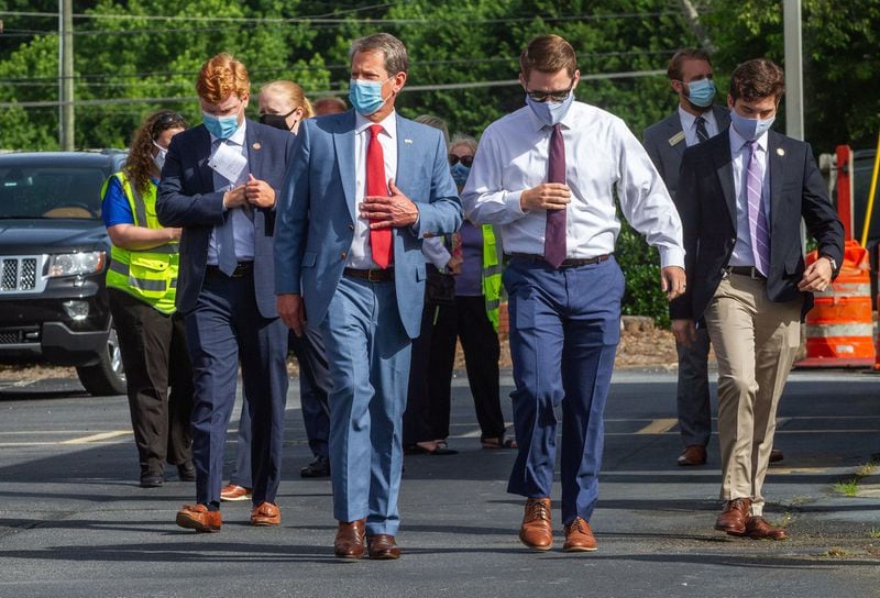 Gov. Brian Kemp tours a coronavirus testing site at Lilburn First Baptist Church in Gwinnett County on Friday, June 26, 2020. STEVE SCHAEFER FOR THE ATLANTA JOURNAL-CONSTITUTION