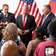 Gov. Brian Kemp, flanked by Department of Community Health Commissioner Russel Carlson, left, and Insurance Commissioner John King during a press conference to discuss the first rollout milestones of the 2019 Patients First Act in Atlanta on Monday, Aug. 19, 2024.   (Ben Gray / Ben@BenGray.com)