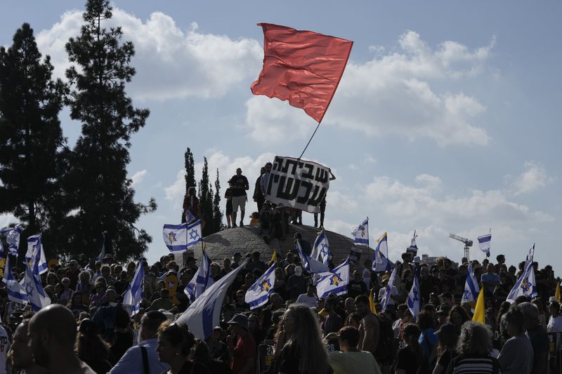 People take part in a protest to call for the immediate release of hostages held in the Gaza Strip by the Hamas militant group in Jerusalem, Sunday, Sept. 1, 2024. (AP Photo/Mahmoud Illean)