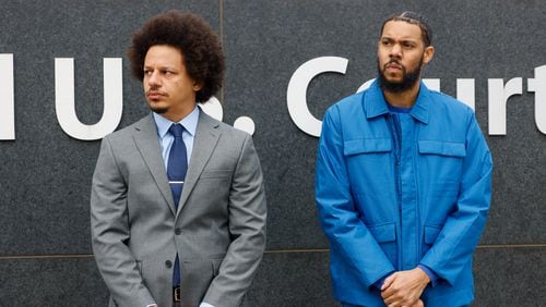 Actors and comedians Eric André (left) and Clayton English stand in front of the Richard B. Russell Federal Building during a press conference in Atlanta on Tuesday, October 11, 2022. André and English filed a lawsuit alleging they were racially profiled during a 2021 search at Hartsfield-Jackson International Airport. (Photo: Arvin Temkar / arvin.temkar@ajc.com)