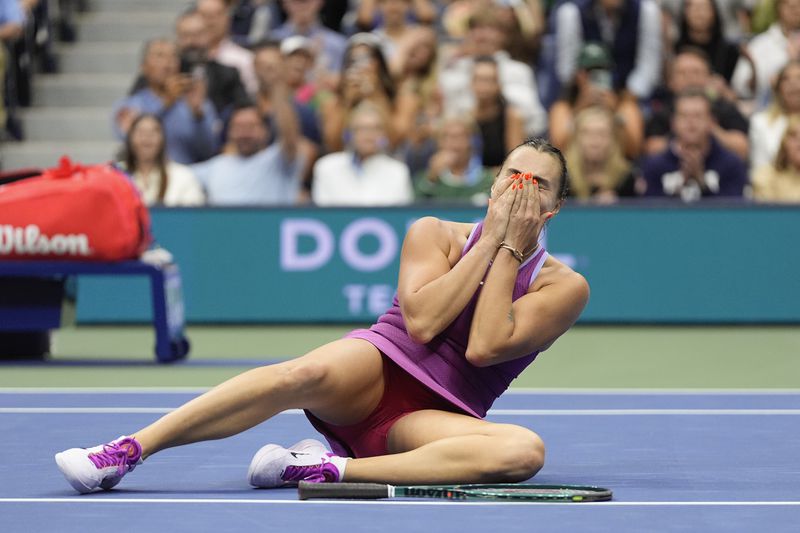 Aryna Sabalenka, of Belarus, reacts after defeating Jessica Pegula, of the United States, to win the women's singles final of the U.S. Open tennis championships, Saturday, Sept. 7, 2024, in New York. (AP Photo/Julia Nikhinson)