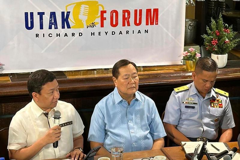 Jonathan Malaya, assistant director-general of the Philippine government’s National Security Council, left, speaks as former senior Associated Justice Antonio Carpio, center, and spokesperson for West Philippine Sea (WPS), Philippine Coast Guard Commodore Jay Tarriela listen during "UTAK Forum, Philippines First: Foreign Policy Forum" in Manila, Philippines Monday, Aug. 19, 2024. (AP Photo/Joeal Calupitan)