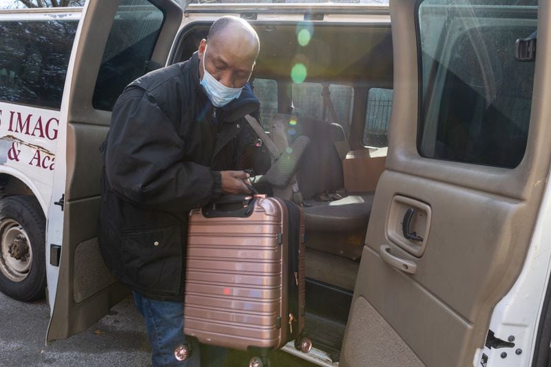 Rev. Siegfried Darcell White, with Concerned Dads Inc. and Not on My Watch Ministry, transports unhoused people from Gateway Center in Atlanta to a warming shelter on Tuesday, Jan. 16, 2024. (Arvin Temkar / arvin.temkar@ajc.com)