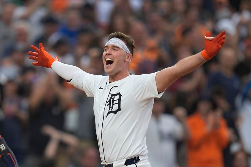 Detroit Tigers' Kerry Carpenter celebrates his grand slam against the Chicago White Sox in the fifth inning of a baseball game, Sunday, Sept. 29, 2024, in Detroit. (AP Photo/Paul Sancya)