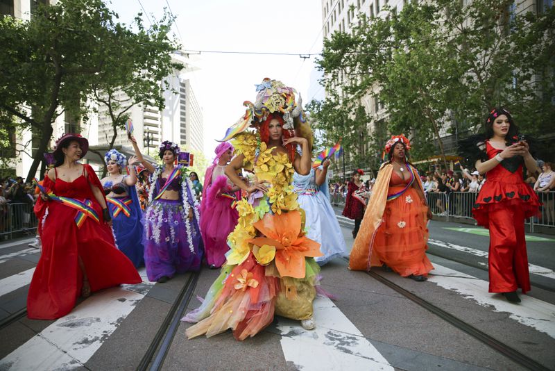 Revelers perform during the NYC Pride March, Sunday, June 30, 2024, in New York. (AP Photo/Andres Kudacki)