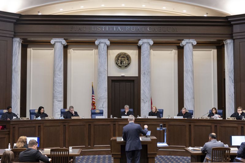 The Supreme Court of Georgia hears oral arguments in Atlanta on Tuesday, Sept. 24, 2024, as it's set to decide whether minor presidential candidates Cornel West and Claudia De la Cruz should be on the November ballot. (Arvin Temkar/Atlanta Journal-Constitution via AP)