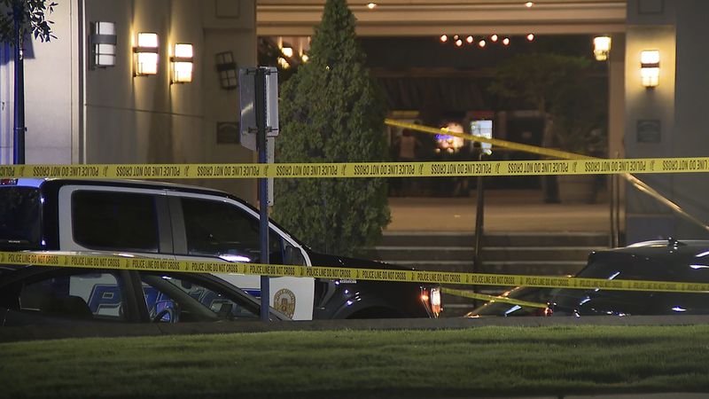 This image provided by WBMA shows police tape near the scene of a shooting in Birmingham, Ala., Sunday, Sept. 22, 2024. (Bill Castle/WBMA via AP)