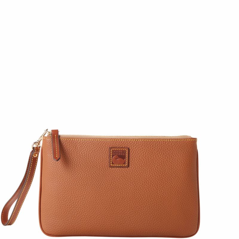 College students can have cash on hand with a chic wristlet. 
(Courtesy of Dooney & Bourke)